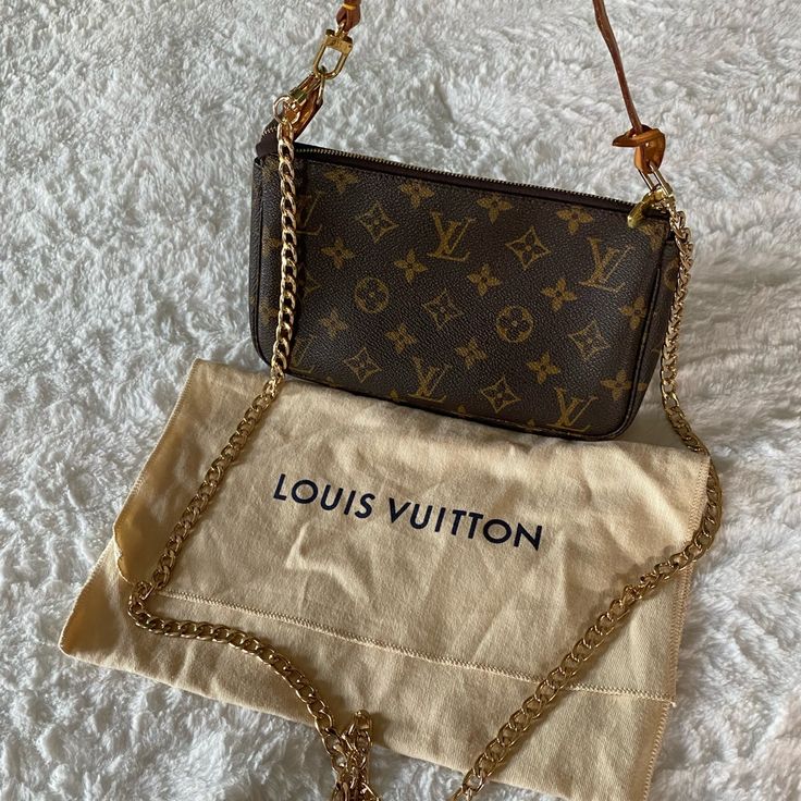 Louis Vuitton Monogram Pochette Accessories Dimensions: 9.3 X 5.3 X 1.6 Inches Date Code: Ar0978 (Shown In Photos) Made In France September 1998 Condition: Excellent Condition - This Vintage Piece Has A Pristine Canvas, No Rips, No Tears, No Outside Marks, Vachetta Has Lightly Darkened Comes With: Lv Vachetta Strap, Generic Gold Chain, And Lv Dust Bag **Please Note: With This Models Early Design A D Ring Was Not Placed On Opposite Side** Please Review All Photos & Description Lv Loop Bag, Lv Pochette Accessories, Louie Vuttion, Small Designer Bags, Louis Vuitton Noe Bb, Multi Pouch, Pochette Accessories, Lv Pochette, Louis Vuitton Crossbody