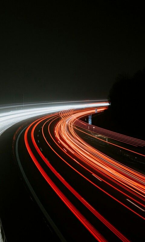 long exposure photograph of highway lights at night