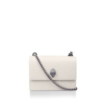 The bone Shoreditch Cross Body bag uses a doubled chain strap sat across the body in silver with leather patches for comfort. The back of the bag features an open pocket for easy to reach items with Eagle head emblem on the front.6.3in (H), 8.7in (L), 3.5in (D)Strap Length: 25.6inTwo compartment interiorSmall open pocket insideLeather Classic Silver Shoulder Bag With Chain Strap, Classic Silver Bag With Chain Strap, Body Bones, Leather Cross Body Purse, Rainbow Bag, Leather Camera Bag, Cross Body Bags, Luxury Purses, Cross Body Purse