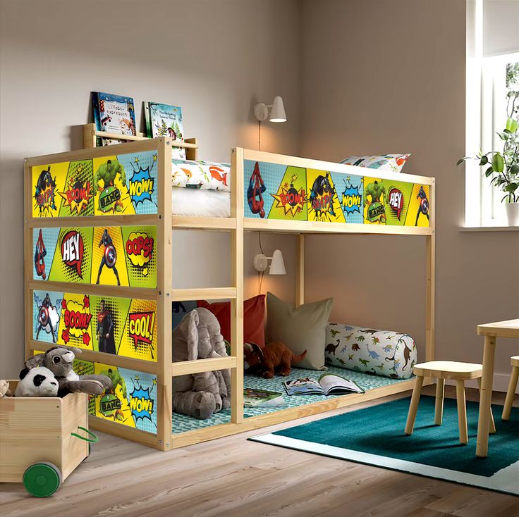 a child's bedroom with bunk beds and toys