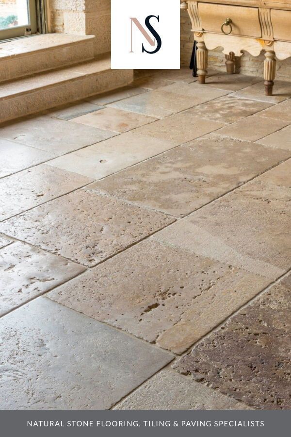 a stone floor with the words s on it and an image of a bench in the background