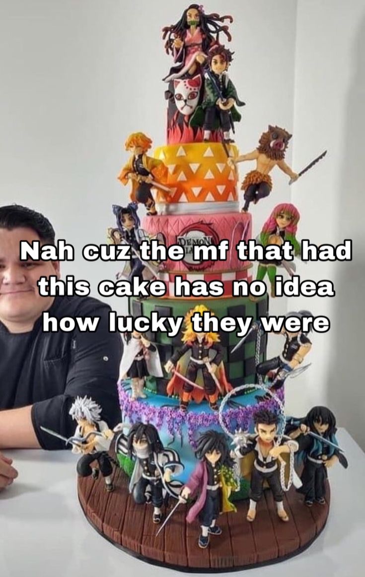 a man sitting in front of a cake with many figurines on it and the caption reads nahh cut the mf that had this cake has no idea how lucky they were