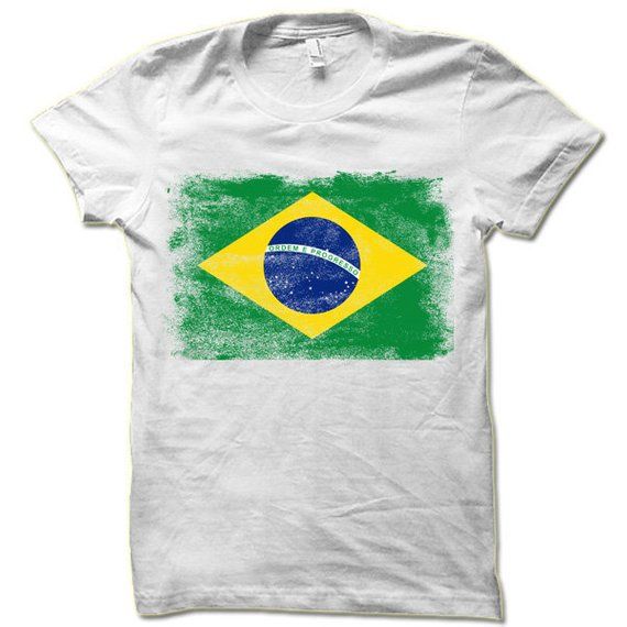 Brazilian Flag short-sleeve crewneck t-shirt. Unisex Fit. Printed with eco-friendly water-based inks. Please refer to the size chart in the last image of the listing (laying flat measurements in inches). Due to the calibration differences between computer monitors, phone screens and tablets, the actual product color may vary slightly from what you are viewing.SHIRT FEATURES:- 4.2 oz., Solid color tees (red, white, blue, green) are 100% combed and ringspun cotton, 30 singles- Athletic Heather Shi Eco-friendly Short Sleeve Cotton T-shirt, Eco-friendly Graphic Tee With Short Sleeves, Eco-friendly Graphic Tee With Crew Neck, Eco-friendly Ink Relaxed Fit Crew Neck T-shirt, Brazilian Flag, Brazil Flag, Funny Gifts For Dad, Phone Screens, Flag Tshirt