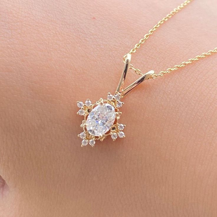 Oval Brilliant Cut Moissanite Pendant 14K Yellow Gold Wedding Pendant Necklace 1.0 TCW Solitaire Charm Pendant Special Gift for her ♠  Stone Details ☛ Stone Weight:  1.0 TCW Oval/Round Cut Moissanite ☛  Gemstone: Moissanite ☛  Stone Color (White) ☛  Stone Luster: Excellent ☛  Stone Clarity: VVS1 ☛  Stone Make: High Quality ☛  Stone Shape: Oval/Round Cut ☛  Metal Change(10k/14k/18k White/Yellow/Rose Gold) ☛  Handmade item ★ Moissanite Guarantee :   Test By Diamond Tester Its Test Show Positive 100% I accept custom-making orders. please contact me if you need this service. All the jewelry in my store is handmade .it may take 2-3 weeks to finish. ♣ Buy with Warranty: ☛ 14 Days Money Back Guarantee; ☛Excellent Customer Service; ☛  Free Shipping and insurance WORLDWIDE; ☛ Free Gift Box. ♣ Shipp Luxury 22k Gold Oval Jewelry, Luxury Oval Pendant Diamond Necklace With Accents, Luxury Oval Pendant For Jewelry Making, Luxury Jewelry With Detachable Oval Pendant, Wedding Oval Pendant Diamond Necklace, Diamond White Oval Pendant Diamond Necklace For Wedding, Oval Pendant Diamond White Necklace For Wedding, Diamond White Oval Pendant Necklace For Wedding, Oval Pendant Halo Wedding Jewelry