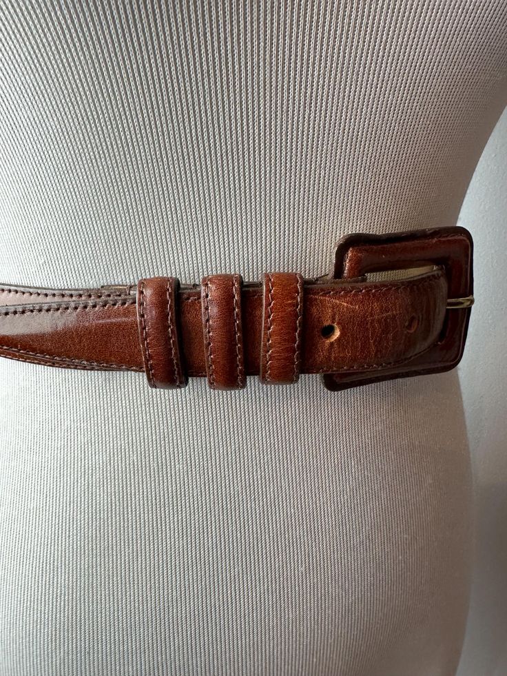 Very nicely made leather belt from the 1990's. Very good quality. Covered leather buckle style. I will say, it has an area with a little specks of imperfections. It's not too distracting. It seems as though the color lifted from a splatter at one time? I still think it's got potential. See all photos.  ✏️✏️✏️DETAILS✏️✏️✏️ Brand: CIPRIANI Size on tag:small  Fits like: X SM- Small Color:  brown Material: leather  Condition: Good (read description/ pics) Item includes: belt ✂ ✂️MEASUREMENTS ✂️✂️ Fi Classic Fitted Belts And Suspenders With Belt Included, Vintage Leather Belt For Business, Vintage Fitted Belt For Formal Occasions, Fitted Vintage Style Belt For Formal Wear, Vintage Fitted Belt For Formal Wear, Formal Brown Belt With Antique Buckle, Vintage Formal Fitted Belt, Formal Brown Belts With Antique Buckle, Vintage Brown Belt For Business