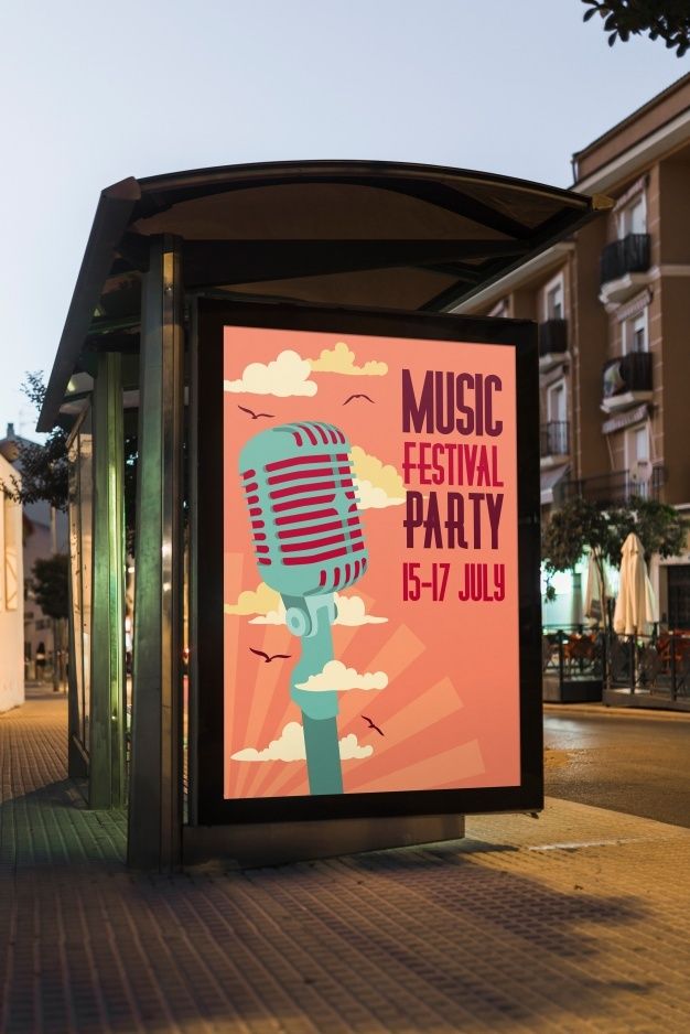 a poster on the side of a bus stop advertising music festival party, with a microphone