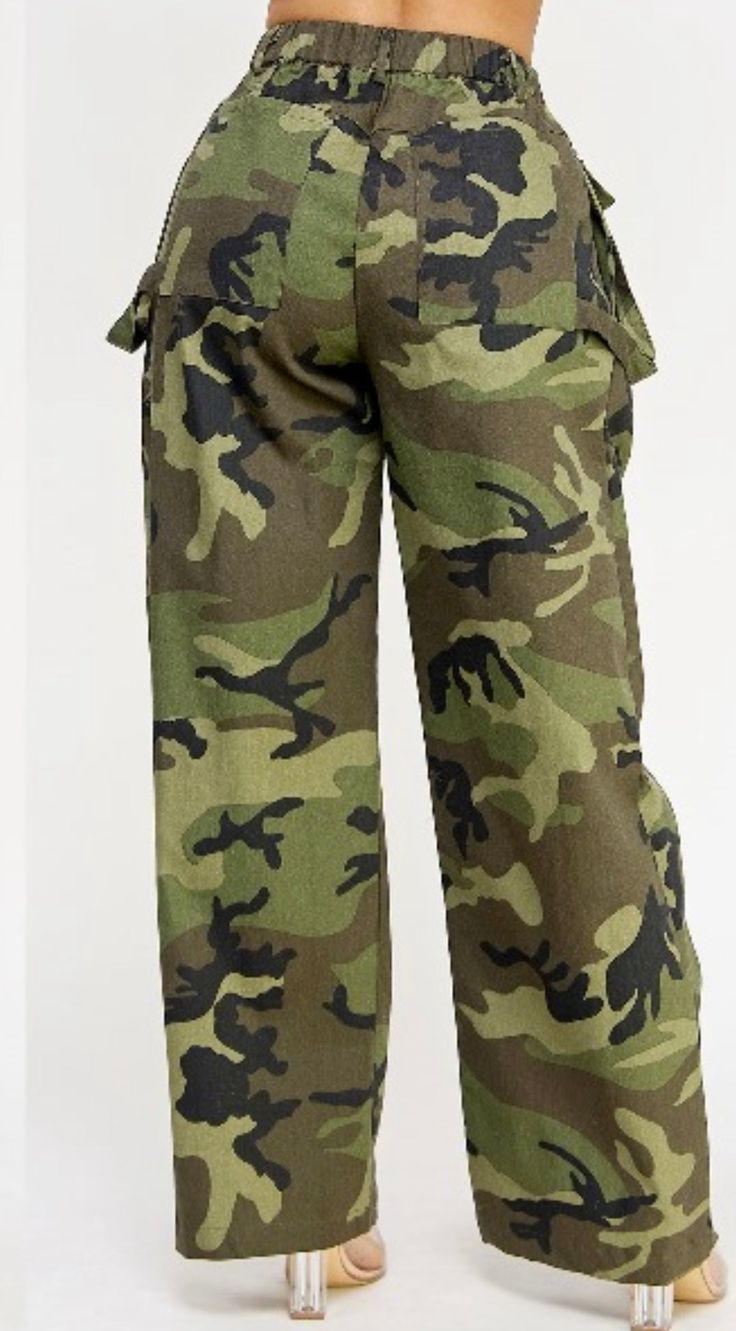 Wide leg camo pants with front wide pockets and elastic waistband Camouflage Straight Leg Parachute Pants With Side Pockets, Camouflage Wide Leg Cargo Bottoms, Spring Combat Pants With Pockets, Military Wide Leg Cargo Bottoms, Camouflage Straight Leg Pants With Multiple Pockets, Military Style Wide Leg Cargo Bottoms, Straight Leg Camouflage Pants With Multiple Pockets, Military Cargo Style Wide Leg Bottoms, Camouflage Wide Leg Bottoms With Multiple Pockets