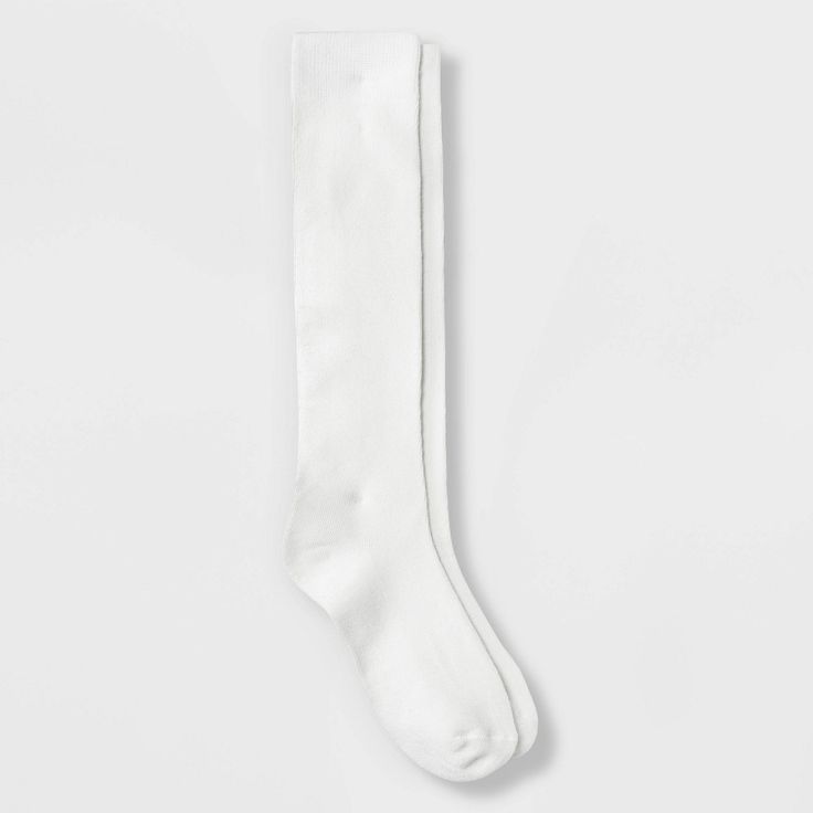 These Women's Knee High Socks from Xhilaration perfectly fit around your legs to highlight your form. You can pair this with a pair of denim shorts or knee-length skirts to complete your look. Not just a very trendy and casual chic look, this also brings you a soft and snuggly comfort throughout the day. If you’re not satisfied with any Target Owned Brand item, return it within one year with a receipt for an exchange or a refund. Fitted Solid Color Knee-high Socks, White Fitted Over The Knee Socks, Fitted White Over-the-knee Socks, White Fitted Over-the-knee Socks, Fitted Cotton Tights For Fall, White Fitted Knee-high Socks, Trendy Stretch White Legwear, Trendy White Stretch Legwear, Trendy White Knee-high Stockings