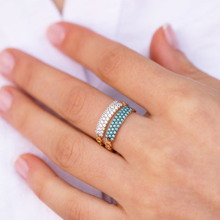 If you're looking for a wedding ring that's a little bit different, these stackable rings with a chain design are perfect for you! They're made of 14K solid gold and come in two models, one with cubic zirconia stones and one with turquoise stones. You can choose the colour that suits you best. And don't worry, we've stamped the word "14K" on them so you can be sure they're made of real gold! FINAL PHOTO APPROVAL BEFORE SHIPPING I just wanted to let you know that each ring is custom-made to perfe Blue Diamond Stackable Jewelry, Turquoise Cubic Zirconia Jewelry For Anniversary, Turquoise Diamond Anniversary Jewelry, Turquoise Open Ring Jewelry For Wedding, Anniversary Turquoise Cubic Zirconia Jewelry, Elegant Stackable Turquoise Open Ring, Elegant Stackable Open Turquoise Ring, Turquoise Round Band Promise Ring, Turquoise Jewelry Ring With Diamond Accents