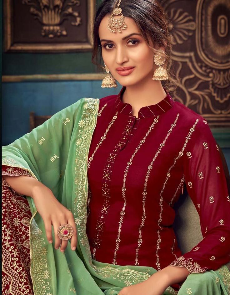 Designer Festive Wear Pure Georgette Sharara Suit Processing Time : 7 Business Days Work : Zari Embroidery Work Fabric:Top : Pure Georgette Bottom : Georgette Dupatta : Georgette Color:Top : Maroon Bottom : Maroon Dupatta : Sea Green Green And Maroon Outfit, Maroon Dupatta, Georgette Sharara, Maroon Outfit, Pakistani Salwar, Zari Embroidery, Georgette Dupatta, Unstitched Dress Material, Salwar Kameez Online