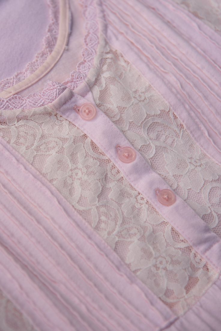 "Sweetest vintage 80's - 90's nightgown! Pale pink soft cotton with white lace and buttons at the chest. Condition: In great vintage condition. Light average wear - no issues to note! Measurements: Seems to best fit a size small - medium Bust: 36\" Waist: 48\" Hips: 48\" Overall Length: 45\" For reference, model is 5'9\"and measures 33/29/39 All measurements are taken flat and then doubled when appropriate. Please let us know if you have any questions about sizing or fit. Please check out the sh Feminine Lace Trim Nightgown For Pajama Party, Pink Delicate Lace Sleepwear For Spring, Spring Pink Lace Nightgown, Pink Lace Sleepwear For Bedtime, Pink Lace Nightgown With Delicate Details, Pink Feminine Sleepwear With Lace Trim, Feminine Pink Sleepwear With Lace Trim, Pink Cotton Nightgown With Lace Trim, Pink Lace Trim Sleepwear For Loungewear