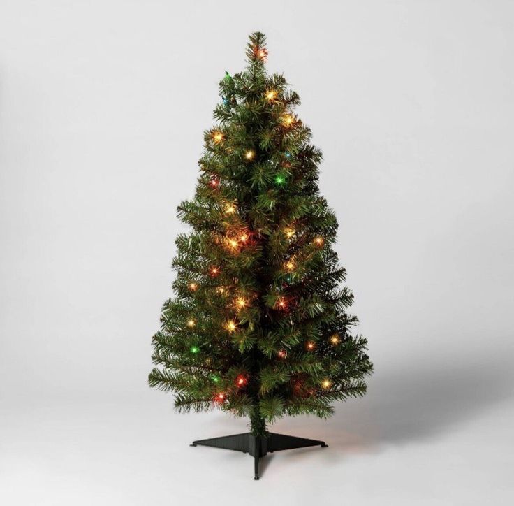 Includes One Tree Multi Color Lights Size: 3 Foot Pre Lit Slim Includes A Stand DISCLAIMER: THIS BOX HAS BEEN OPENED FOR CHECKING PURPOSES Christmas Tree Multicolor Lights, Christmas Tree Multicolor, 3ft Christmas Tree, Alberta Spruce, Christmas Tree Clear Lights, Charlie Brown Christmas Tree, Realistic Artificial Christmas Trees, Pretty Christmas Trees, Twinkly Lights