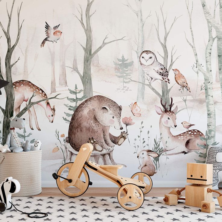 an animal themed wallpaper in a children's room with wooden toys and decor