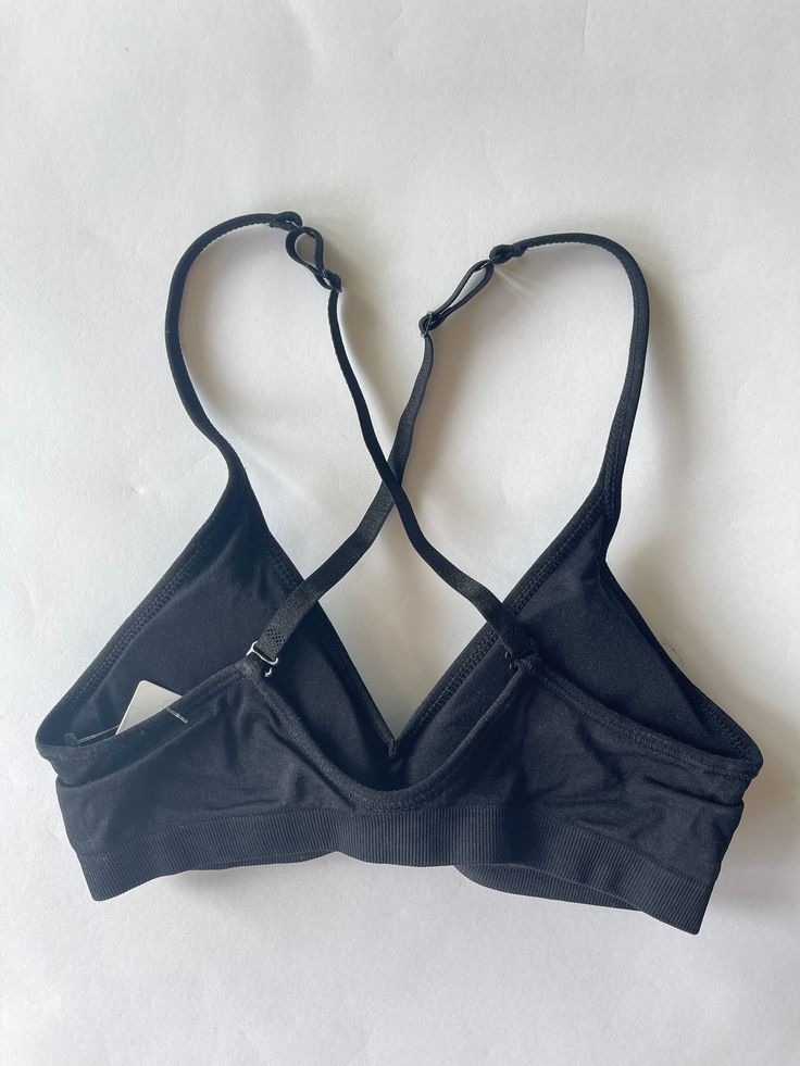 A-B cup V bra. Our convertible V Bras come in 2 cup sizes A/B & C/D The back straps can be criss crossed to accommodate racerback tops Strappy Stretch Bra With Built-in Support, Everyday Bra With Padded Cups, Black Triangle Top Bra With Adjustable Straps, Gym Bra With Adjustable Straps And Fitted, Gym Bra With Adjustable Straps And Fitted Design, T-back Stretch Bra With Removable Pads, Seamless Sports Bra With Cross Back, Workout Bra With Cross Back Straps, Workout Cross Back Bra