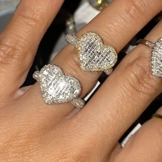 two heart shaped rings on top of each other