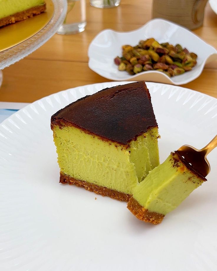 a piece of cheesecake on a white plate