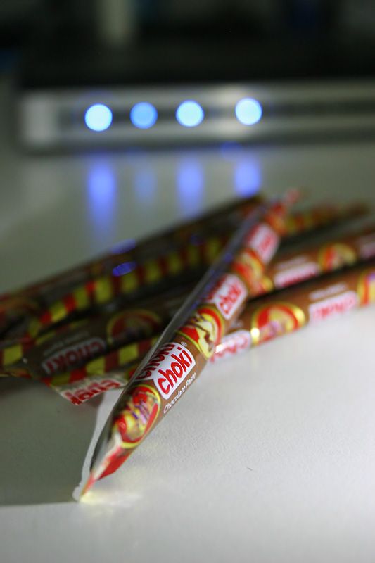 some candy sticks are sitting on a table