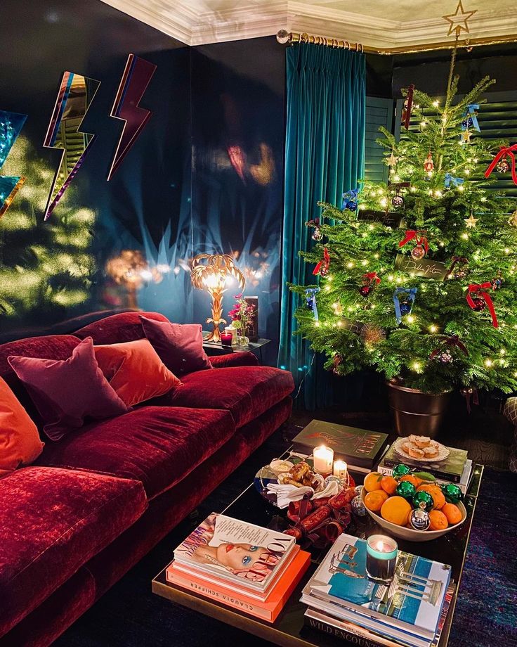 a living room filled with furniture and a christmas tree