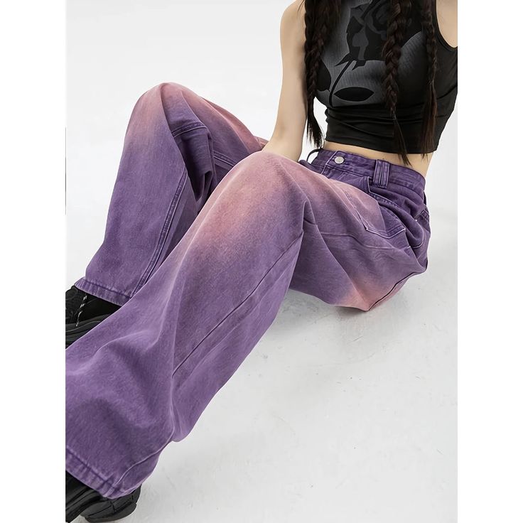 Discover Your New Favorite Jeans Step into style with our High Waist Purple Wide Leg Jeans, the perfect blend of vintage flair and modern streetwear. Crafted with care, these jeans combine the timeless appeal of denim with a chic and contemporary silhouette, making them a must-have in any fashion-forward wardrobe. Key Features Material: Premium blend of cotton and polyester for comfort and durability. Style: Trendy wide-leg pants with a high waist design. Decorations: Elegant button details and practical pockets. Closure: Secure zipper fly. Wash: Light wash finish for a stylish, worn-in look. Product Details Our Wide Leg Jeans are designed to offer both comfort and style. The high waist and regular fit type ensure a flattering fit for all body types, while the full-length cut and light was Purple Mom Jeans Outfit, Casual Mid-rise Cargo Jeans For Spring, Grunge Wide Leg Cargo Jeans With Five Pockets, Retro High Waist Cargo Jeans For Spring, Retro Mid-rise Bottoms For Streetwear, Urban High Waist Flare Jeans For Streetwear, Urban High-waist Flare Jeans For Streetwear, Summer Streetwear Full-length Flare Jeans, Casual Mid-rise Faded Bottoms