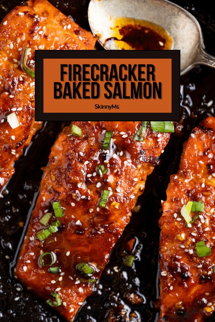 grilled salmon with sauce and green onions in a skillet