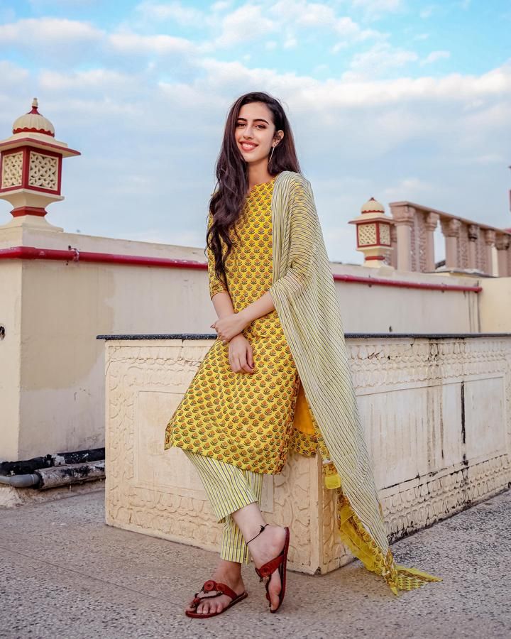 If your everyday wear sets high fashion standards for people around you, you gotta pick this Lemon Floral Handblock Printed Cotton Suit Set by Aachho. Crafted in fine cotton, the lightweight fabric gives maximum breathability and comfort, so you remain relaxed inside and stylish outside. The lightness of the fabric is Cotton Kurties, Bollywood Outfits, Casual College Outfits, Teen Girl Dresses, Dress Indian Style, Anarkali Suit, Cotton Suits, Traditional Fashion, Trending Fashion