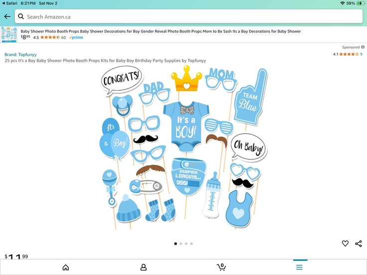 a photo booth with blue props for baby shower decorations and mustaches on it's stickers