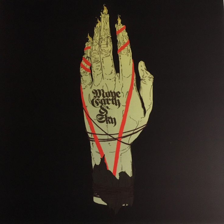 a hand with red tape on it is holding something in the air that says zombie hands