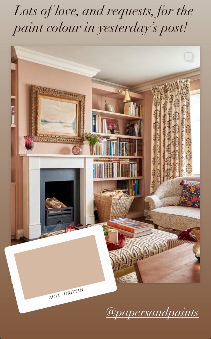 a living room with pink walls and furniture