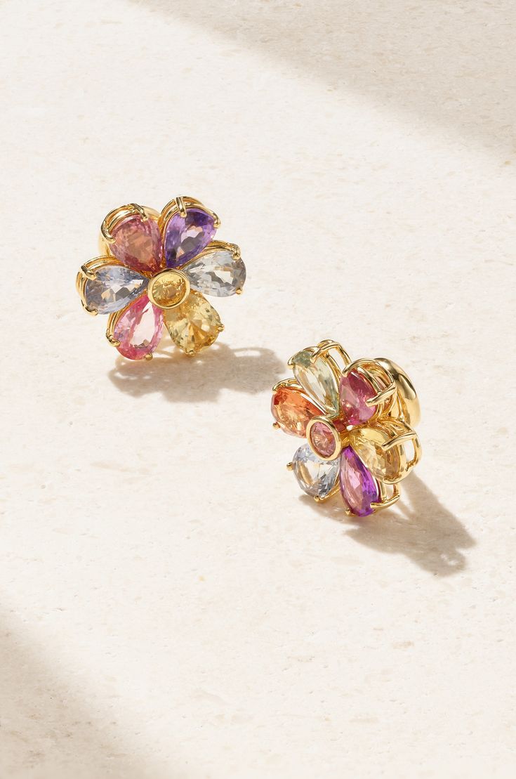 Each of Bayco's designs are one-of-a-kind, so you'll never be caught in the same piece as someone else. These earrings are handcrafted from 18-karat gold cast in the shape of pretty flowers and set with faceted sapphires in a variety of soft, colorful hues. Luxury Multi-stone White Gold Earrings, Luxury White Gold Multi-stone Earrings, Luxury Multicolor Diamond Earrings, Luxury Multi-stone 14k Gold Earrings, Luxury Yellow Gold Flower Shaped Cluster Earrings, Luxury Gemstone Cluster Earrings For Anniversary, Luxury Yellow Gold Cluster Earrings With Gemstones, Elegant Multi-stone Cluster Earrings For Anniversary, Luxury Gemstone Flower-shaped Earrings