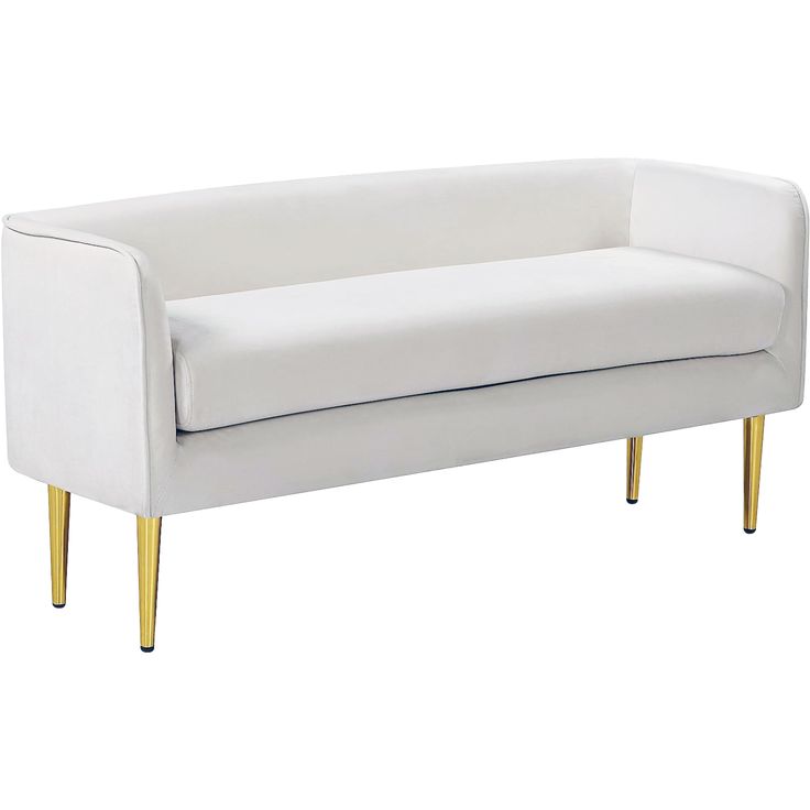 a white couch with gold legs on a white background