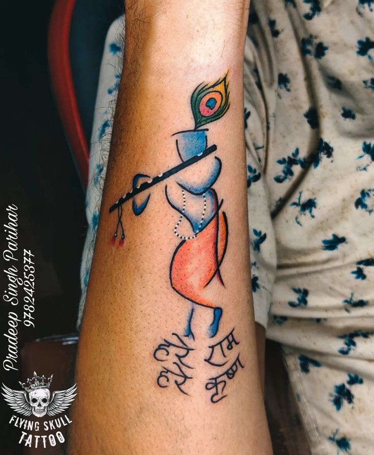 a person with a tattoo on their arm