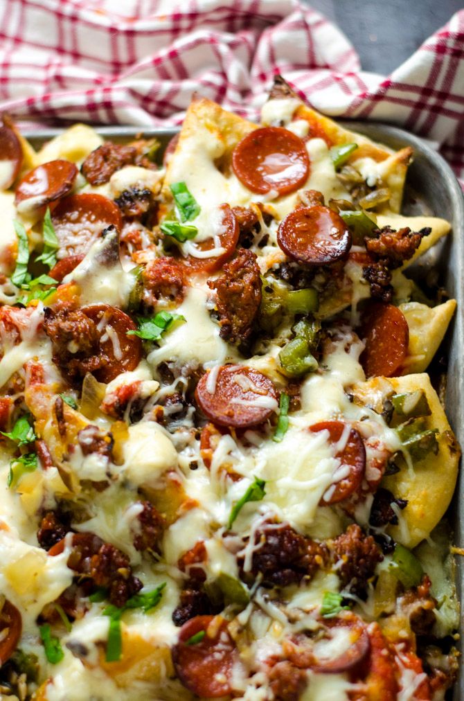 a casserole dish filled with meat and cheese