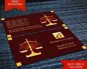 two business cards with the scales of justice on them, both in gold and red