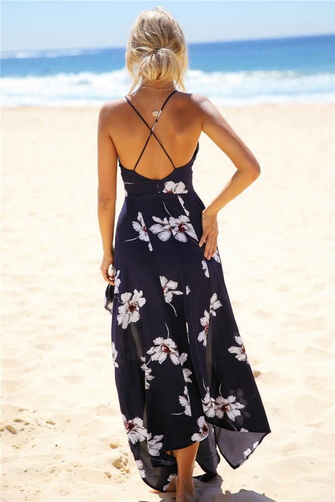 The Believers Maxi Dress features a crossover back, a plunging V neckline, and asymmetric skirt. The dress has a hidden zipper at the back. It's ideal for a beachside luncheon or a day at the races! Maxi dress. Top is lined. Cold hand wash only. Model is standard XS and is wearing XS. True to size. Print may vary in placement. Non stretchy fabric. Polyester. Day At The Races, Asymmetric Skirt, Maxi Dress Navy, Asymmetrical Skirt, Dress Top, Race Day, Stretchy Fabric, Hidden Zipper, Crossover