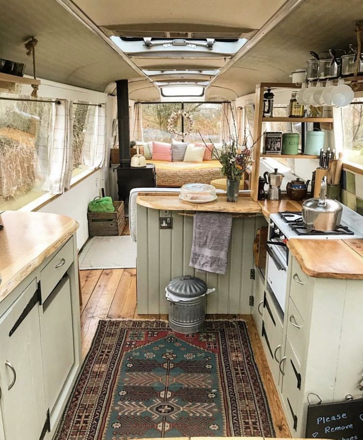 the interior of an rv is clean and ready to be used as a camper