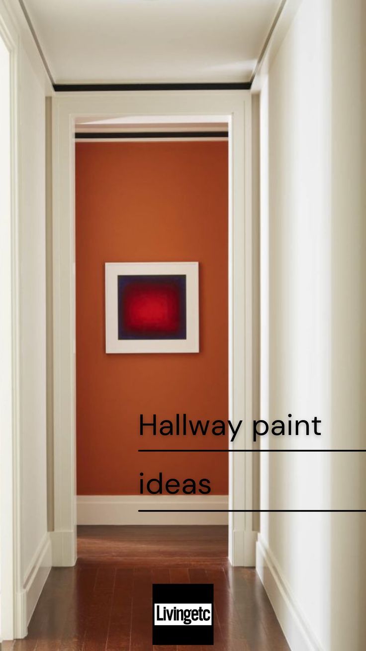 the hallway is painted in orange and white