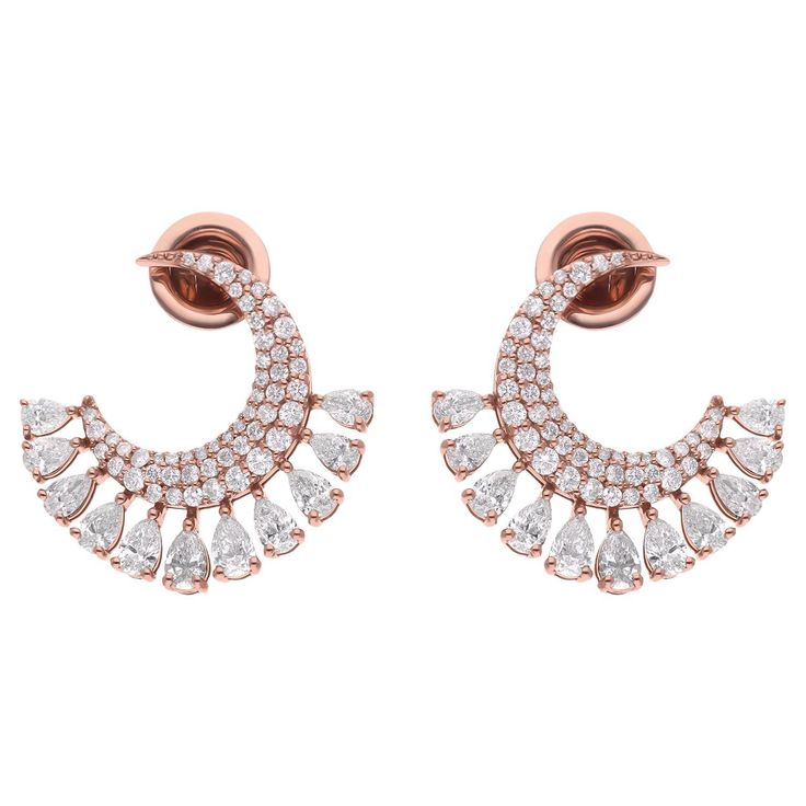 Crafted with precision and care, these earrings are a testament to the artisan's dedication to quality and craftsmanship. Each diamond is carefully selected for its brilliance and clarity, ensuring that every pair of earrings sparkles with unparalleled beauty. Item Code :- SEE-15641E Gross Wt. :- 5.80 gm 18k Rose Gold Wt. :- 5.37 gm Natural Diamond Wt. :- 2.15 Ct. ( AVERAGE DIAMOND CLARITY SI1-SI2 & COLOR H-I ) Earrings Size :- 19 mm approx. ✦ Sizing ..................... We can adjust most item Luxury Crescent-shaped Women's Earrings, Diamond Tops, Diamond Bracelet Design, Crescent Moon Earrings, Diamond Jewelry Necklace, Pear Cut Diamond, Sparkle Earrings, Station Necklace, Moon Earrings