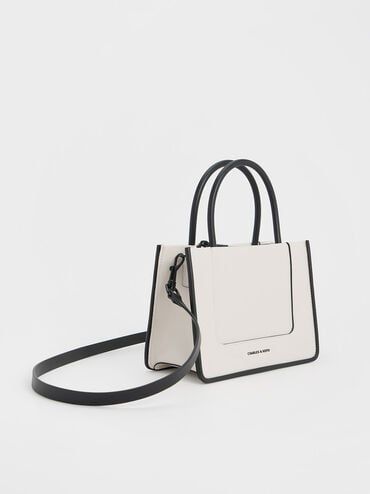 Cream Mini Daylla Tote Bag | CHARLES & KEITH Modern Everyday Recyclable Bags, Modern Recyclable Bags For Everyday Use, Modern Recyclable Shoulder Bag For Shopping, Modern Recyclable Tote Bag, Recyclable Double Handle Shoulder Bag For Shopping, Recyclable Double Handle Shoulder Bag For Daily Use, Eco-friendly Recyclable Shoulder Bag With Double Handle, Trendy Everyday Recyclable Bags, Everyday Recyclable Double Handle Bags