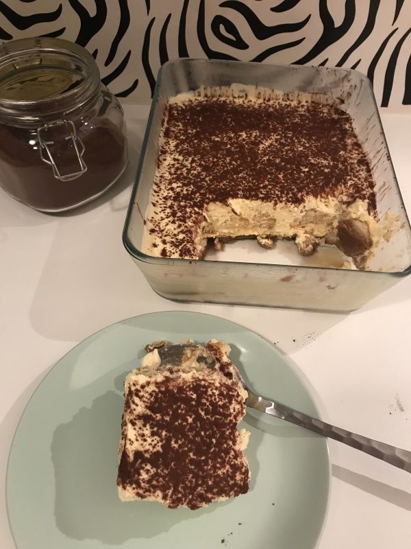 a piece of cake sitting on top of a blue plate