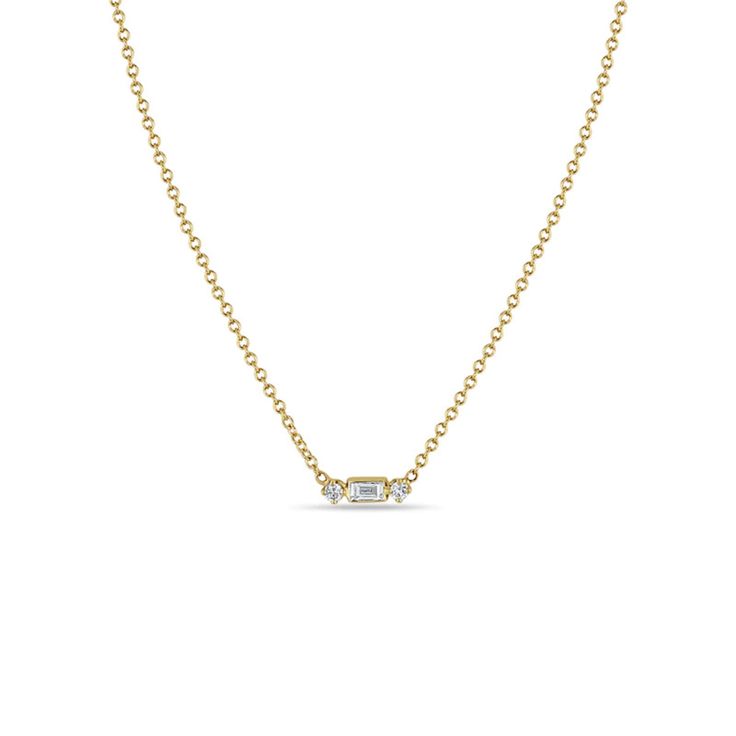 14k yellow gold cable chain necklace with a baguette diamond in the center and two prong set round white diamonds on each side Accessories Necklaces, Zoe Chicco, Cable Chain Necklace, Gold Chain With Pendant, Round Necklace, Diamond Pendant Necklace, Baguette Diamond, Metal Necklaces, White Diamonds