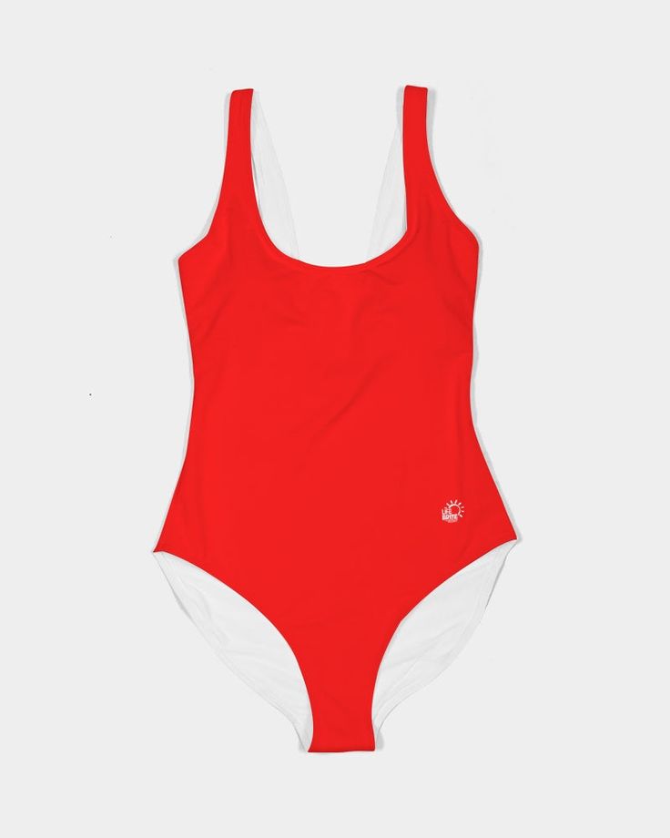 Product Details Looks like your summer just got BRITEr! Our NEW and improved Lucid one-piece swimsuit now has a built-in shelf bra and removable cups for extra coverage. This sporty design is sure to compliment all body types. Vibrant, practical, and UPF 50+ -- let's face it, this swimsuit has it going on! The whole family can be matching in our safety-conscious ultra bright swimwear all season long. Smooth, breathable fabric Scoop neck, tank straps Open back Built in bra, soft removable cups UP Red Swimwear With Built-in Bra For Swimming, Casual Swimwear With Built-in Bra, White Sports Swimwear With Built-in Bra, Casual One-piece Swimwear With Built-in Bra, Summer Swimwear With Built-in Cups For Pool, Sporty Swimwear With Uv Protection For Summer, Red Swimwear For Water Sports In Summer, Red Beachwear For Water Sports, Contoured Nylon Swimwear For The Beach