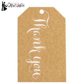 a brown tag with the word love on it and white writing in cursive font