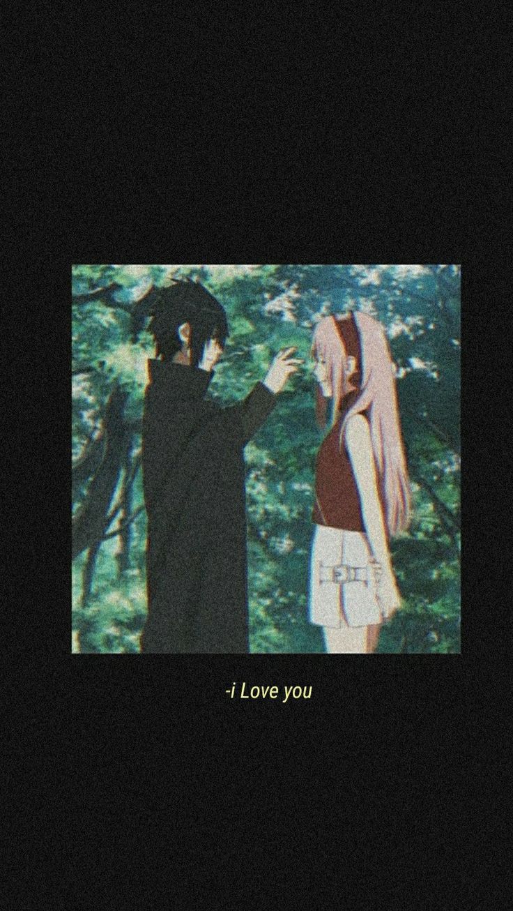 two people standing next to each other in front of trees with the words i love you