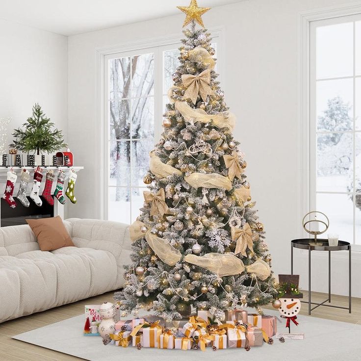 a living room with a christmas tree decorated in gold and white ribbons, presents under the tree