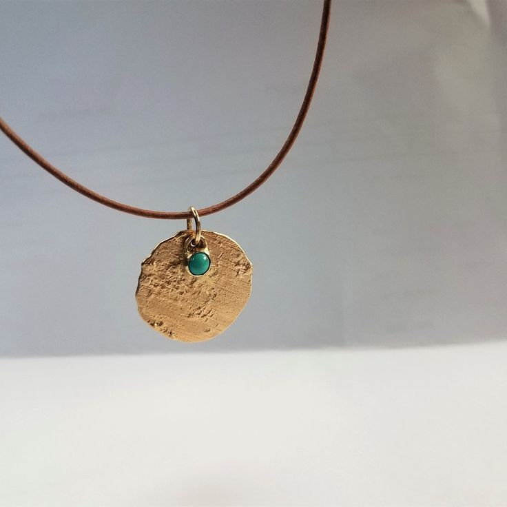 The Pendants Made From 14 Karats Solid Yellow Gold. The Chain Made Of Brown Leather (You Can Choose A Different Color). Chain Length 17.7inch/45cm'. 1 Pendant Size 18x18mm/ 0.70x0.70inch. 1 Turquoise On A Gold Pendant Size 5mm/ 0.19inch 1 Turquoise Stone. Necklace For Men Or Women. Necklace With 2 Pendants. Raw Design Solid Gold Pendant, And Small Turquoise Stone On The Small Solid Gold Pendant. Hand-Made One Of A Kind. Available In All Sizes, Or Gold Chains Instead Of Leather. Bohemian Yellow Gold Necklaces For Everyday, Bohemian Yellow Gold Necklace For Everyday Wear, Bohemian Yellow Gold Everyday Necklace, Bohemian Yellow Gold Necklace For Everyday, Artisan Yellow Gold Necklaces For Jewelry Making, Artisan Yellow Gold Medallion Necklace, Blue Coin Pendant Jewelry, Blue Hammered Jewelry As Gift, Blue Hammered Jewelry As A Gift