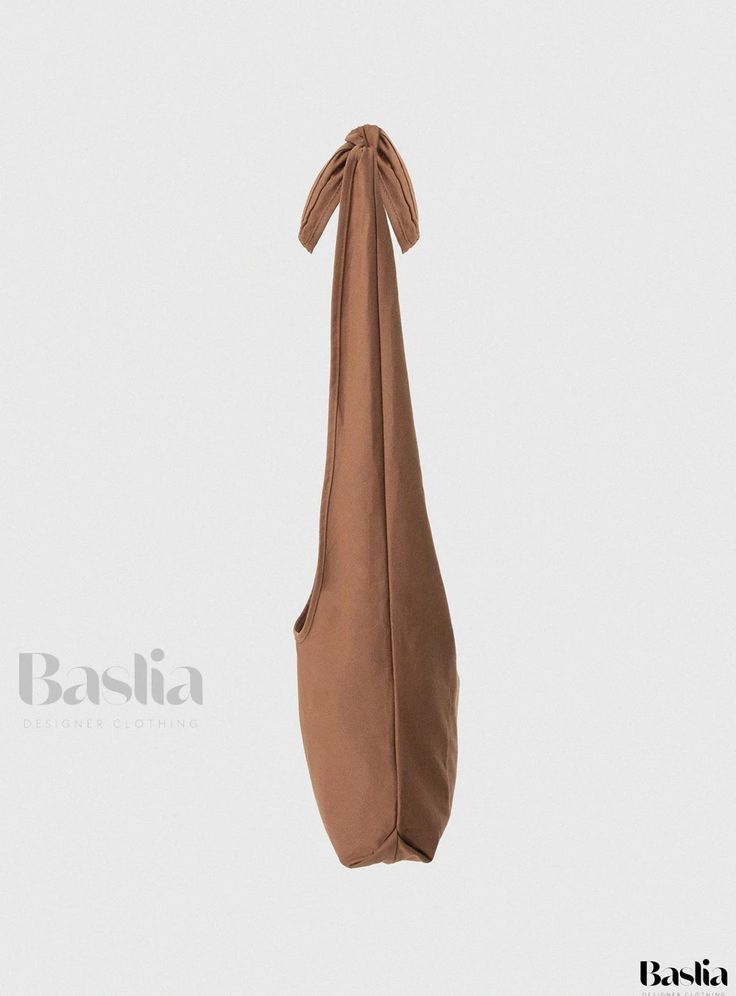 Baslia - Softly Remembered Brown Tote Bag Chic Bags With Long Strap, Chic Hobo Bag With Long Strap For Daily Use, Shopping Tote Baguette Bag With Single Shoulder Strap, Chic Long Strap Tote Shoulder Bag, Shopping Baguette Tote Bag With Single Shoulder Strap, Baguette Tote Bag With Single Shoulder Strap For Shopping, Elegant Brown Shoulder Bag With Long Strap, Brown Bucket Bag With Long Handle, Chic Hobo Shoulder Bag With Long Strap