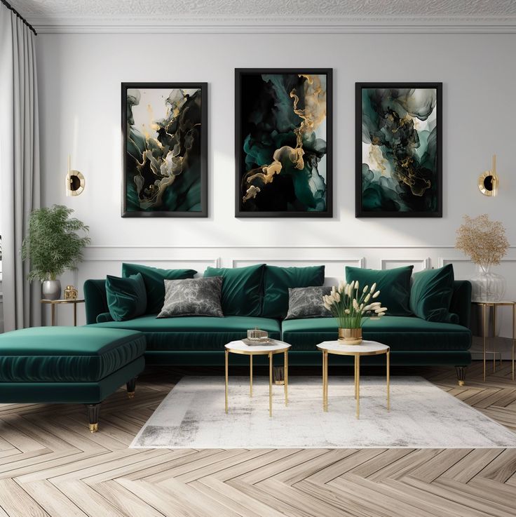 a living room filled with green couches and paintings on the wall above them,