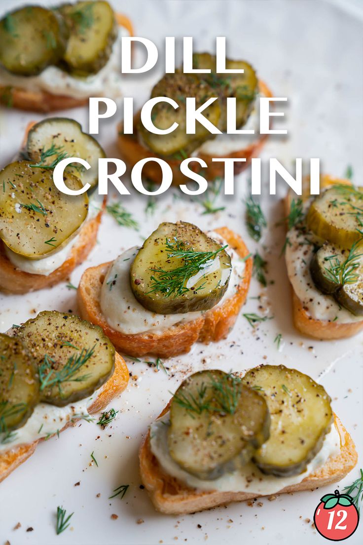 pickle crostini with cream cheese and dill on top