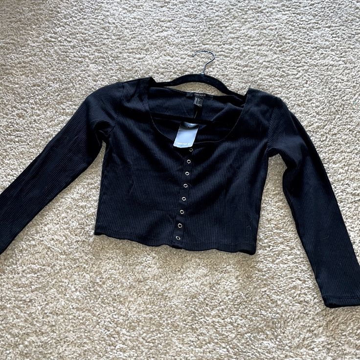 Black Long Sleeve Crop Top Snap Buttons In Front New With Tags Never Worn Everything Must Go!! All Clothes $9 And Under Will Be 4 For $10. All Shoes $10 And Under Will Be 2 For $9 Or Best Offer. $50 Bundles 30% + Free Shipping $70 Bundles 45% + Free Shipping $100 Bundles 65% + Free Shipping. Open To Best Offer Or Counter Offers As Well. -Pet Household But Do Wash Everything Then Place In Storage Container To Keep Safe. Upon Purchase I Try My Best To Get All If Any Hairs Off Items Before Shipping Casual Cropped Tops For Going Out, Forever 21 Black Crop Top For Day Out, Forever 21 Black Casual Crop Top, Black Casual Crop Top By Forever 21, Casual Black Forever 21 Crop Top, Forever 21 Casual Tops For Going Out, Black Casual Crop Top For Going Out, Forever 21 Black Crop Top, Forever 21 Casual Crop Top For Night Out