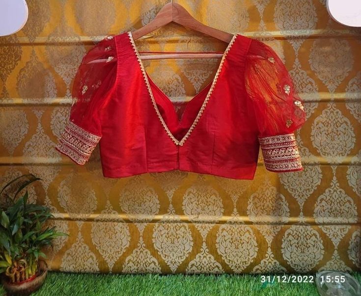 Fully customised Ready to ware Bridal or Party ware blouses Fabric: Body-Banarasi silk              Sleeves - Net with sequence motifs Sleeves: Puff sleeves Size: Free size (Adjustable) or you can give your measurements Padded: yes (customisable) Color :Any color customisation available    Blouse is completely customised item,you can choose your favorite color and alter the design like cut or sleeves according to your choice. These are primium quality products and best service can be assured. As Festive Designer V-neck Blouse, Semi-stitched Blouse For Wedding Eid, V-neck Traditional Wear With Resham Embroidery For Party, Semi-stitched Blouse For Wedding And Eid, Festive V-neck Blouse Piece With Zari Work, Eid Wedding Semi-stitched Blouse, Traditional V-neck Blouse With Zari Work, V-neck Traditional Wear With Pallu For Party, V-neck Blouse Piece For Wedding Festivals